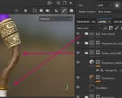 Tu'lia's Staff in Substance 3D Painter showing the completed curved lower wood shaft and brass collar.