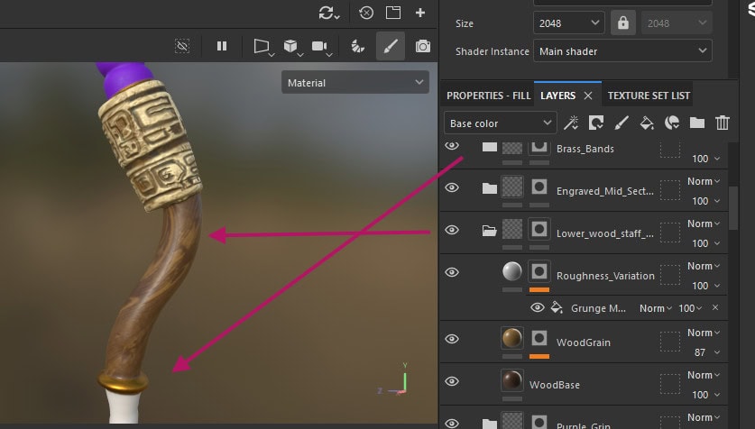 Tu'lia's Staff in Substance 3D Painter showing the completed curved lower wood shaft and brass collar.